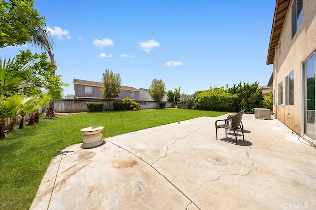 12337 Columbia Ln, Eastvale, CA 91752 - fenced backyard featuring a patio area