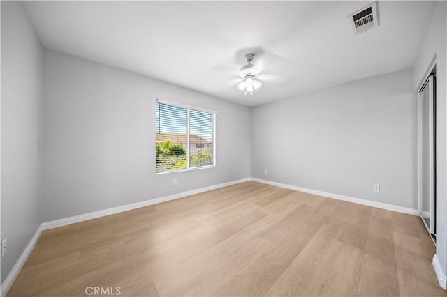 12337 Columbia Ln, Eastvale, CA 91752 - unfurnished bedroom with light wood-style flooring, a closet, and ceiling fan