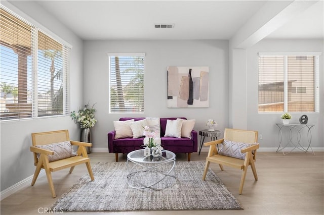 12337 Columbia Ln, Eastvale, CA 91752 - living room with baseboards and wood finished floors