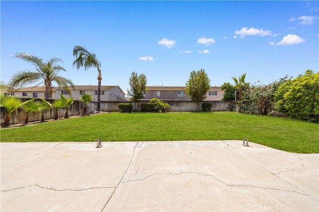 12337 Columbia Ln, Eastvale, CA 91752 - fenced backyard featuring a patio