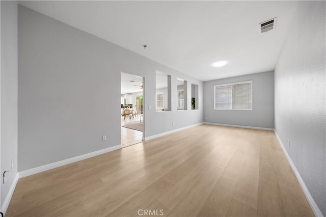 12337 Columbia Ln, Eastvale, CA 91752 - spare room featuring light wood-type flooring and baseboards