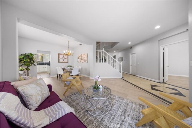 12337 Columbia Ln, Eastvale, CA 91752 - living room featuring stairs, a chandelier, recessed lighting, and wood finished floors