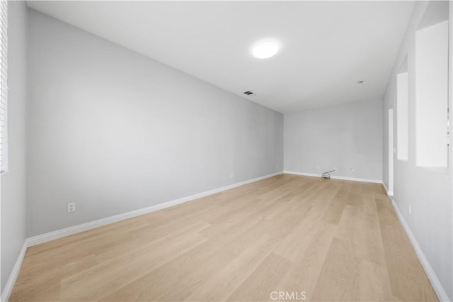 12337 Columbia Ln, Eastvale, CA 91752 - empty room with light wood-style flooring and baseboards