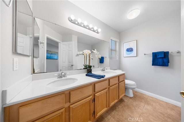12337 Columbia Ln, Eastvale, CA 91752 - bathroom featuring double vanity and tile patterned floors