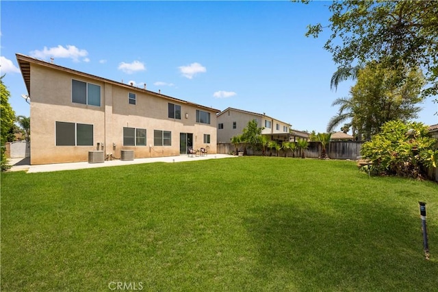 12337 Columbia Ln, Eastvale, CA 91752 - rear view of house featuring stucco siding, a fenced backyard, and a patio