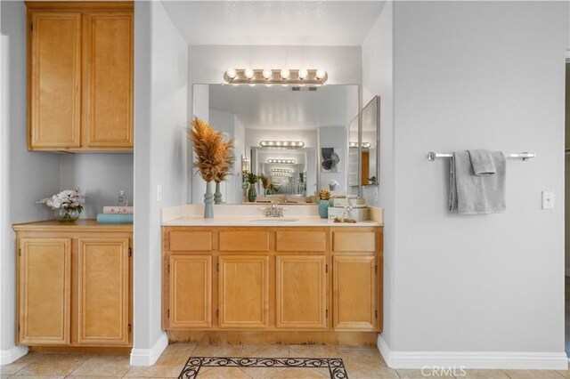 12337 Columbia Ln, Eastvale, CA 91752 - full bathroom featuring vanity and tile patterned flooring