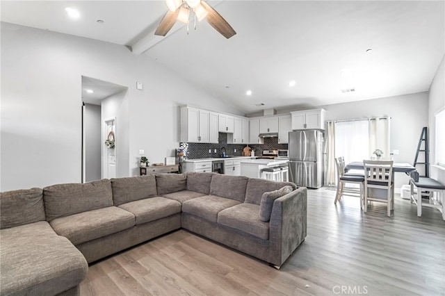 22375 Fairmead Cir, Chowchilla, CA 93610 - living area with beverage cooler, ceiling fan, light wood finished floors, and recessed lighting