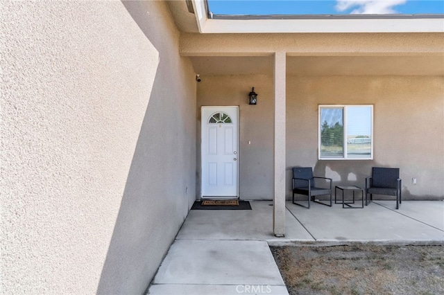 22375 Fairmead Cir, Chowchilla, CA 93610 - view of exterior entry featuring stucco siding