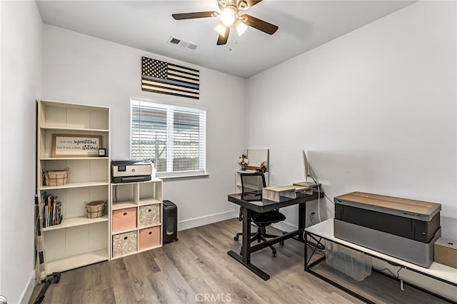 22375 Fairmead Cir, Chowchilla, CA 93610 - office featuring a ceiling fan and wood finished floors