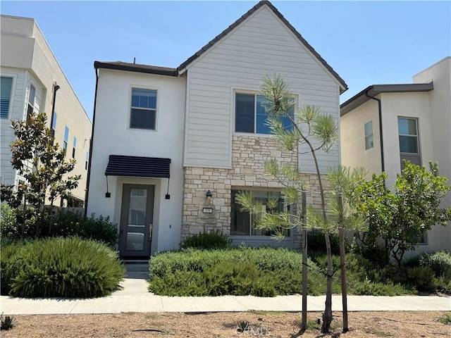 158 Scale, Irvine, CA 92618 - view of front facade with stone siding and stucco siding