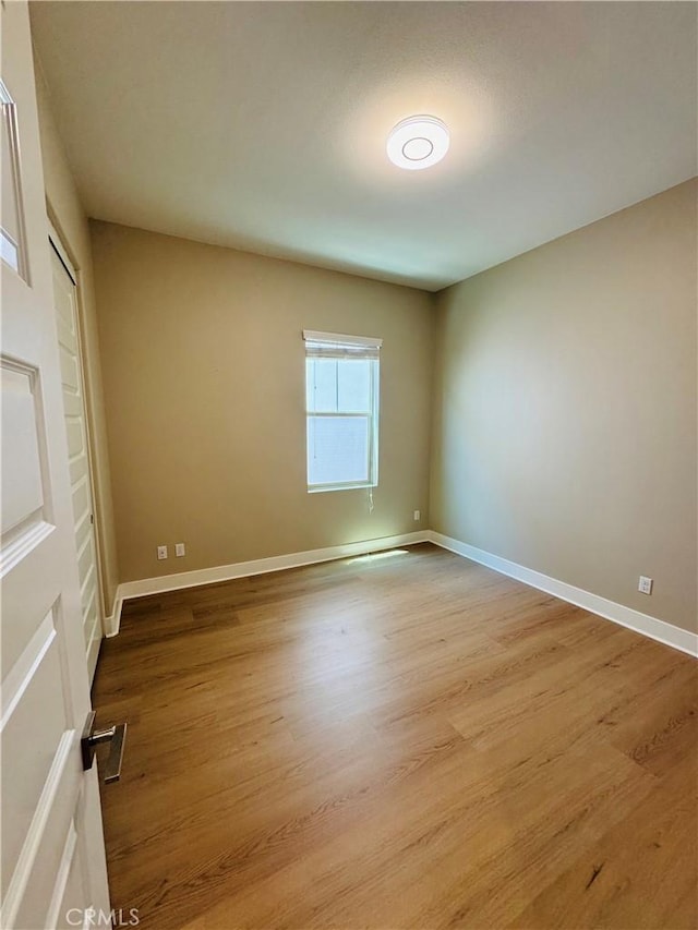 158 Scale, Irvine, CA 92618 - spare room featuring wood finished floors