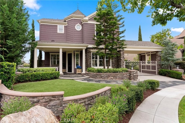 37 Craftsbury Pl, Ladera Ranch, CA 92694 - rear view of property featuring covered porch and a lawn
