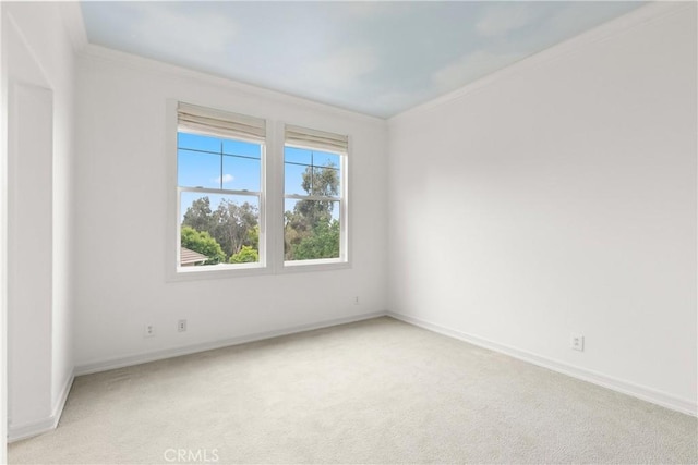 37 Craftsbury Pl, Ladera Ranch, CA 92694 - spare room featuring crown molding and light carpet