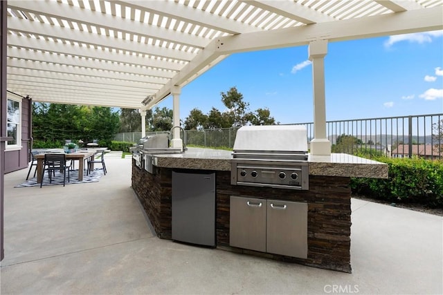 37 Craftsbury Pl, Ladera Ranch, CA 92694 - fenced backyard with an outdoor kitchen, a patio, outdoor dining space, and a pergola