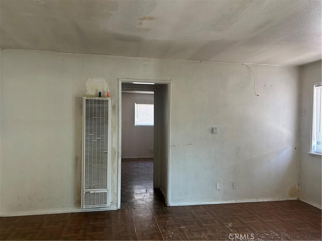 2121 Down St, Riverside, CA 92507 - spare room with a heating unit and baseboards