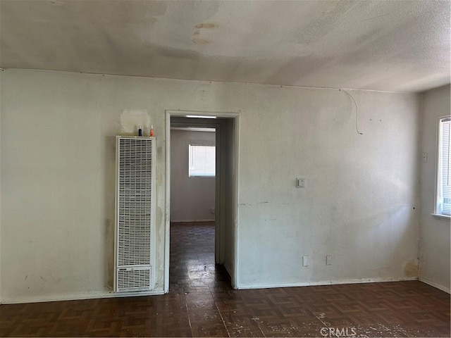 2121 Down St, Riverside, CA 92507 - spare room with a heating unit and baseboards