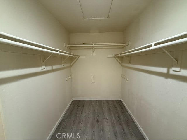 27745 Desert Pl, Castaic, CA 91384 - walk in closet with wood finished floors