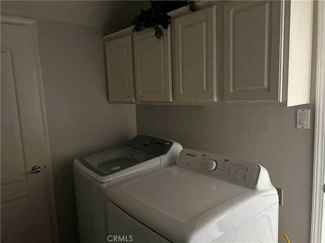 5825 Sky Lakes Ave, Bakersfield, CA 93313 - laundry room featuring independent washer and dryer and cabinet space