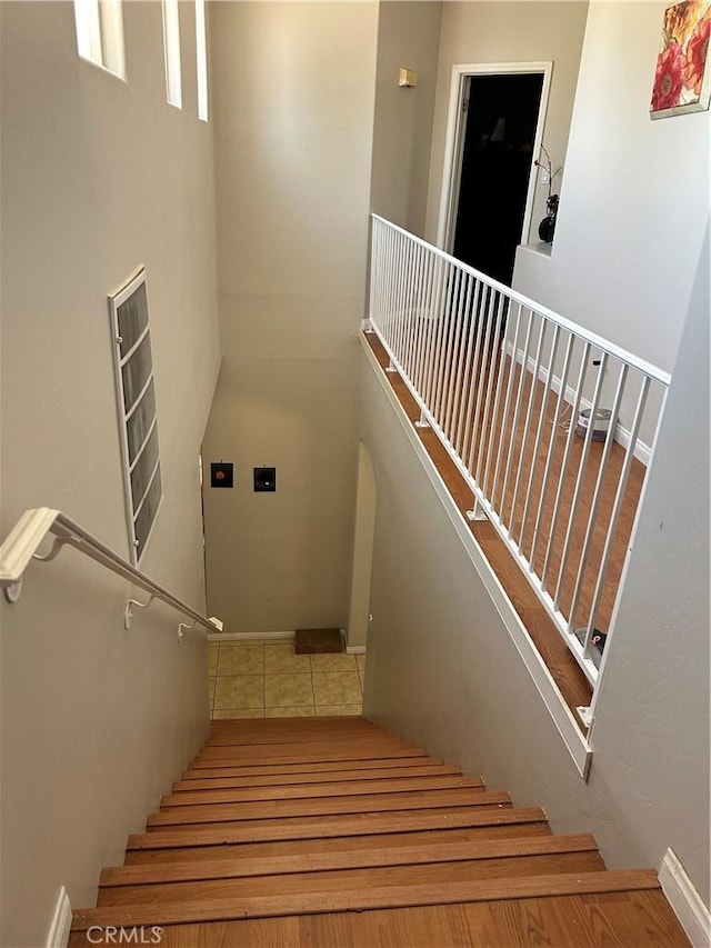 5825 Sky Lakes Ave, Bakersfield, CA 93313 - staircase featuring tile patterned floors and baseboards