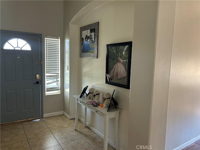 5825 Sky Lakes Ave, Bakersfield, CA 93313 - entrance foyer featuring light tile patterned floors and baseboards