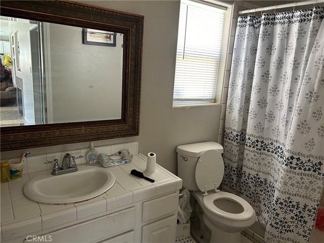 5825 Sky Lakes Ave, Bakersfield, CA 93313 - full bath featuring vanity and a shower with shower curtain
