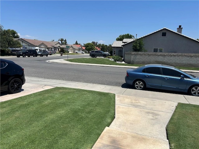5825 Sky Lakes Ave, Bakersfield, CA 93313 - view of grassy yard featuring a residential view
