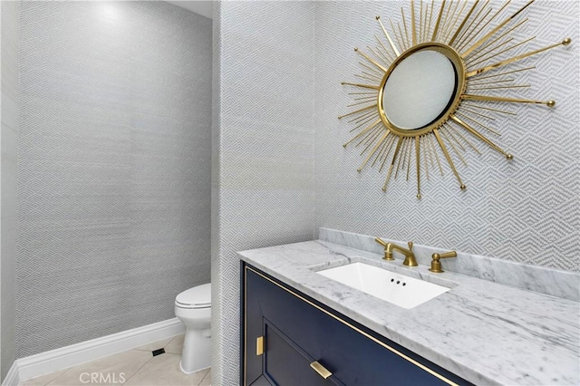 7 Telescope, Newport Coast, CA 92657 - bathroom featuring toilet, vanity, tile patterned flooring, and baseboards
