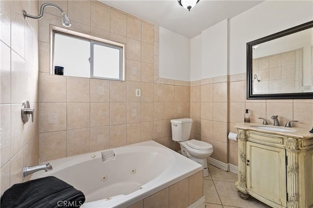 921 N Brand Blvd, San Fernando, CA 91340 - full bathroom featuring a tub with jets, tile walls, vanity, and tile patterned floors