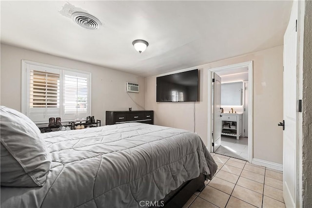 921 N Brand Blvd, San Fernando, CA 91340 - bedroom with light tile patterned flooring and a wall mounted air conditioner