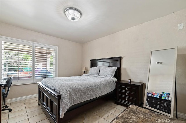 921 N Brand Blvd, San Fernando, CA 91340 - bedroom featuring light tile patterned floors and baseboards