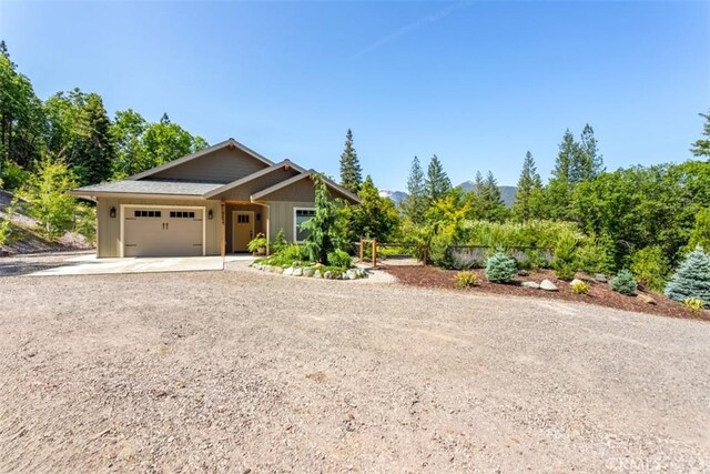 9116 Rocky Rd, Weed, CA 96094 - view of front of property with an attached garage and driveway