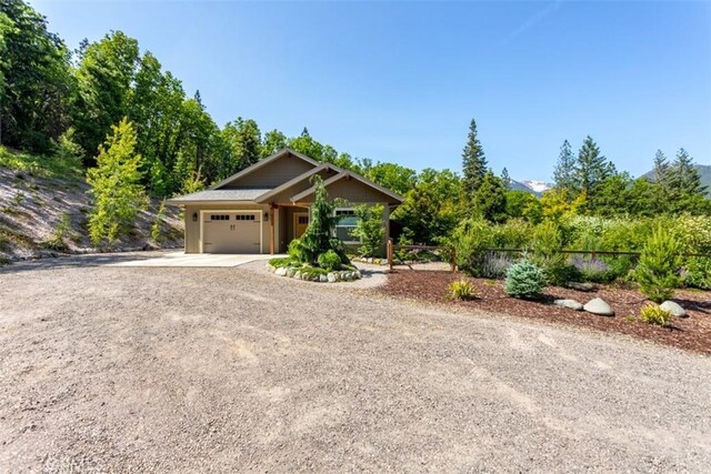 9116 Rocky Rd, Weed, CA 96094 - view of front of house featuring driveway and an attached garage