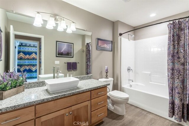 9116 Rocky Rd, Weed, CA 96094 - bathroom with wood finished floors, vanity, shower / bath combo, and toilet