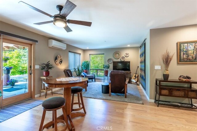 9116 Rocky Rd, Weed, CA 96094 - dining space featuring a wall mounted AC, light wood-style floors, plenty of natural light, and recessed lighting