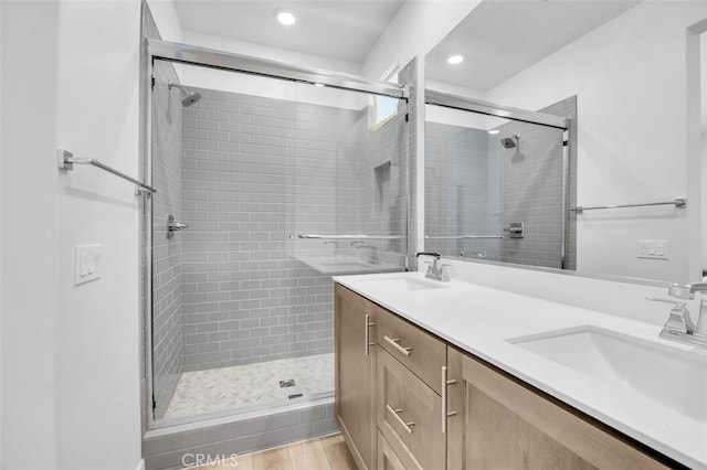 332 Gelding Way, Rancho Mission Viejo, CA 92694 - full bath featuring a shower stall, double vanity, recessed lighting, and wood finished floors