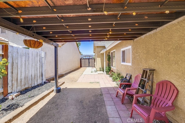 2846 Nandina Dr, Palmdale, CA 93550 - view of patio with a storage unit