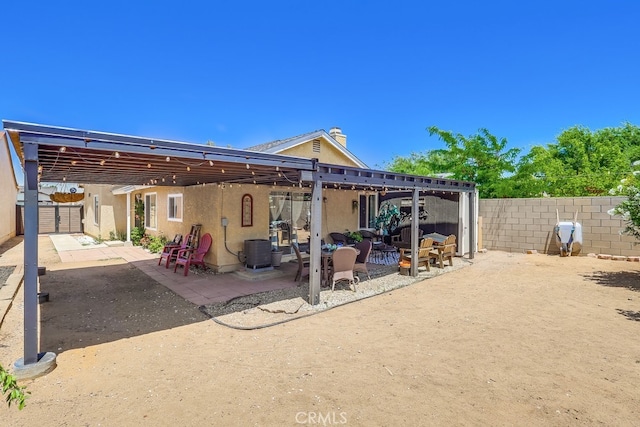 2846 Nandina Dr, Palmdale, CA 93550 - rear view of property featuring a patio, stucco siding, and a fenced backyard