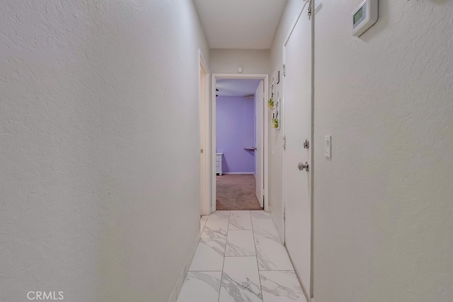 2846 Nandina Dr, Palmdale, CA 93550 - corridor featuring light marble finish floors and baseboards
