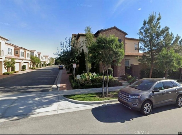 122 Tidal Line, Irvine, CA 92620 - view of asphalt road with a residential view and curbs
