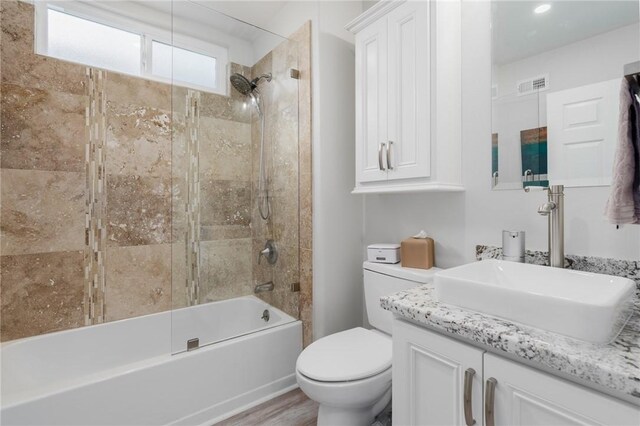 27705 Calle Valdes, Mission Viejo, CA 92692 - bathroom with vanity, bathtub / shower combination, and wood finished floors
