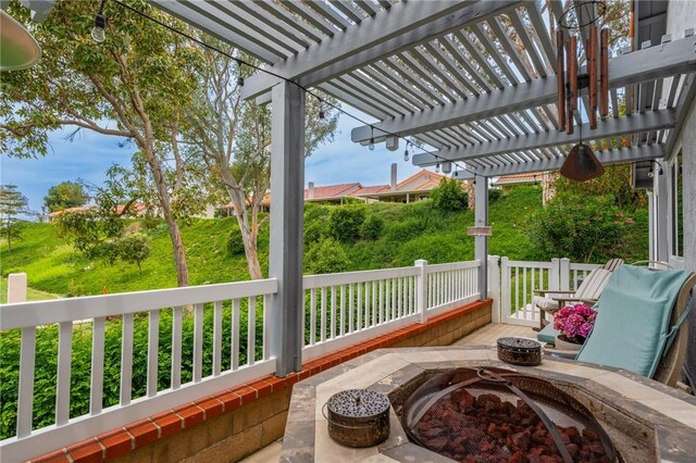 27705 Calle Valdes, Mission Viejo, CA 92692 - view of patio with a fire pit and a pergola