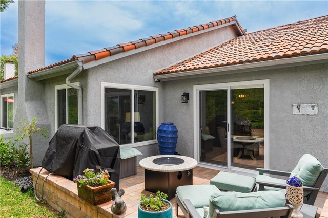 27705 Calle Valdes, Mission Viejo, CA 92692 - view of patio with an outdoor fire pit and area for grilling