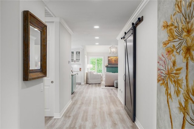 27705 Calle Valdes, Mission Viejo, CA 92692 - corridor with light wood-style flooring, a barn door, and recessed lighting