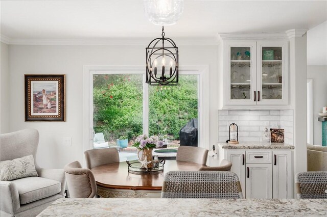 27705 Calle Valdes, Mission Viejo, CA 92692 - dining area with a chandelier and crown molding