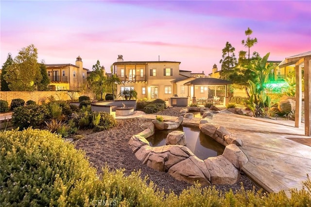 19599 Highland Terrace Dr, Walnut, CA 91789 - back of house featuring a patio, stucco siding, and a gazebo