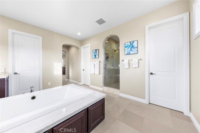 19599 Highland Terrace Dr, Walnut, CA 91789 - bathroom with a shower stall, vanity, baseboards, recessed lighting, and tile patterned flooring