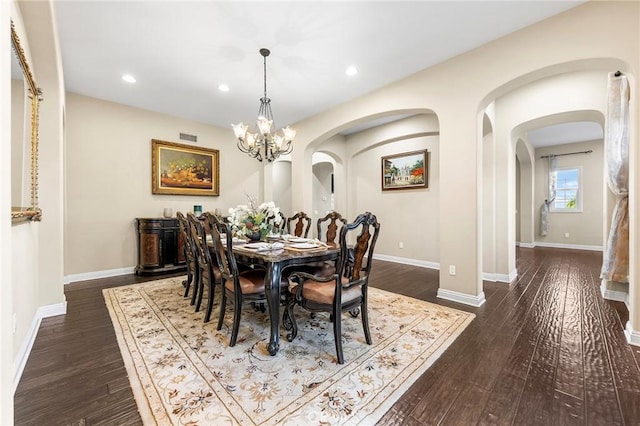 19599 Highland Terrace Dr, Walnut, CA 91789 - dining space featuring arched walkways, recessed lighting, dark wood finished floors, baseboards, and a chandelier