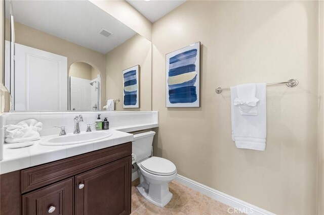 19599 Highland Terrace Dr, Walnut, CA 91789 - bathroom with vanity, toilet, and baseboards