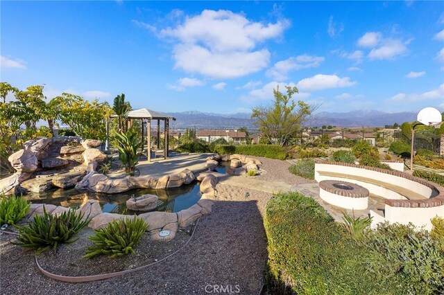19599 Highland Terrace Dr, Walnut, CA 91789 - view of yard featuring a mountain view, a gazebo, and a garden pond