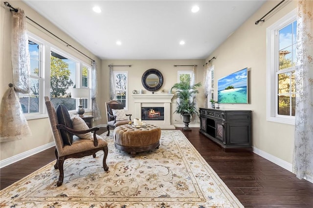 19599 Highland Terrace Dr, Walnut, CA 91789 - living area featuring a glass covered fireplace, baseboards, recessed lighting, and dark wood-style floors